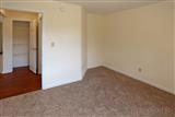 one bedroom apt. bedroom, view of hallway closet